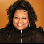 Derreka Rollins poses for a portrait