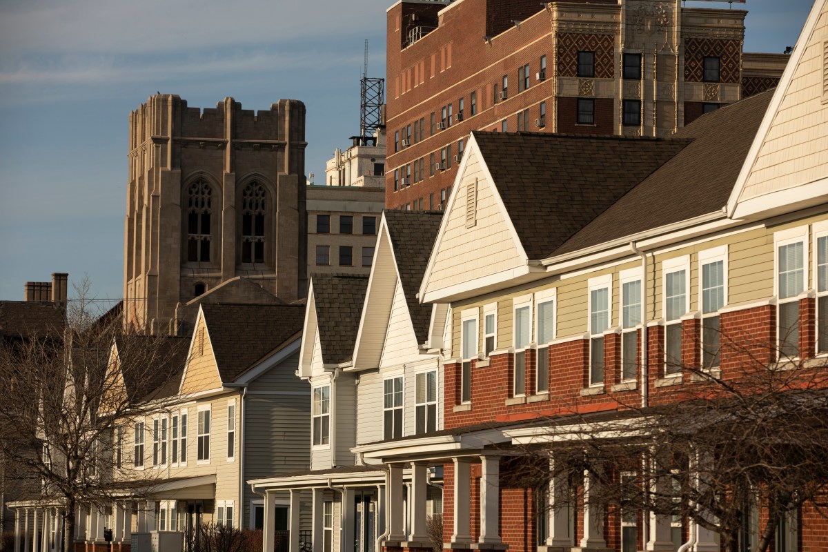Afternoon light shines on housing and the historic skyline of downtown Gary, Indiana.